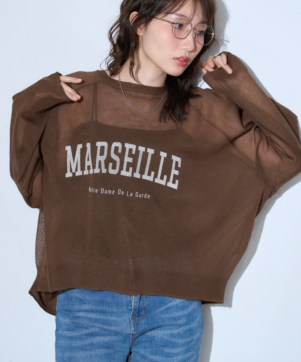 ロゴプリントシアーニット