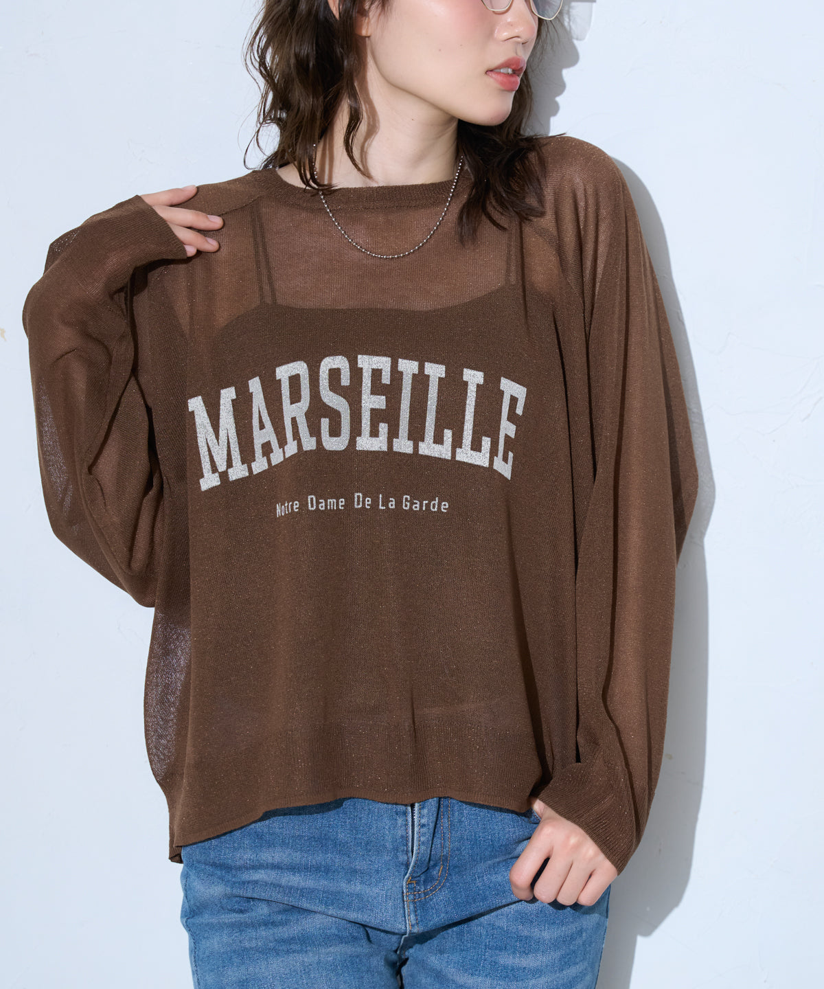 ロゴプリントシアーニット