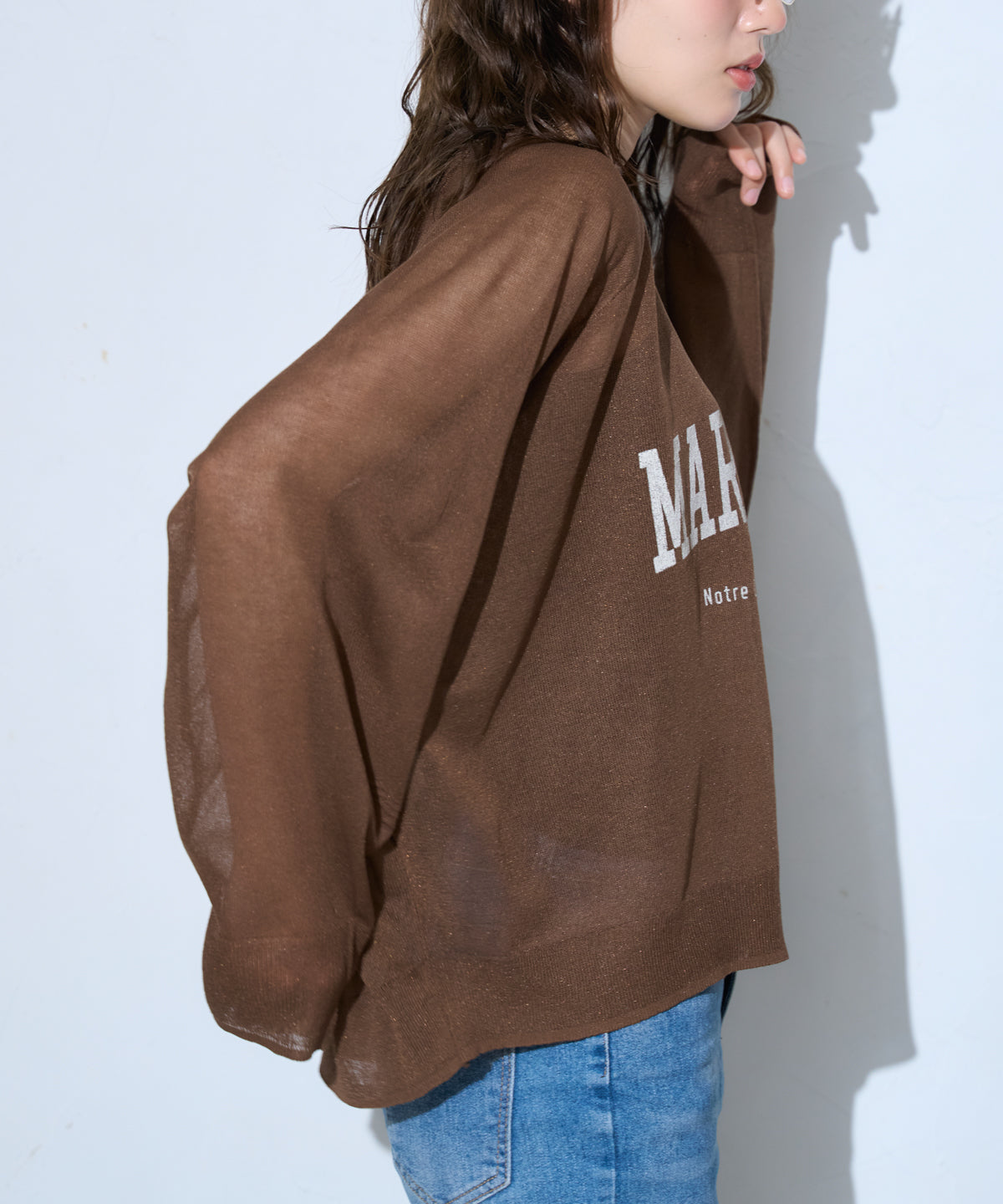 ロゴプリントシアーニット